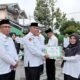 Dedikasi dan Inovasi Tiada Henti, Silvia Kardena Raih Penghargaan ASN Berprestasi di Kemenag Kota Solok dalam layanan Kepegawaian.
