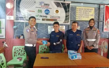 Sinergi Lawan Polusi! Polresta Bukittinggi Gandeng SMSI Bagikan Masker ke Jurnalis & Warga